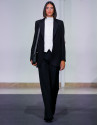 Black blazer with embossed decorative button