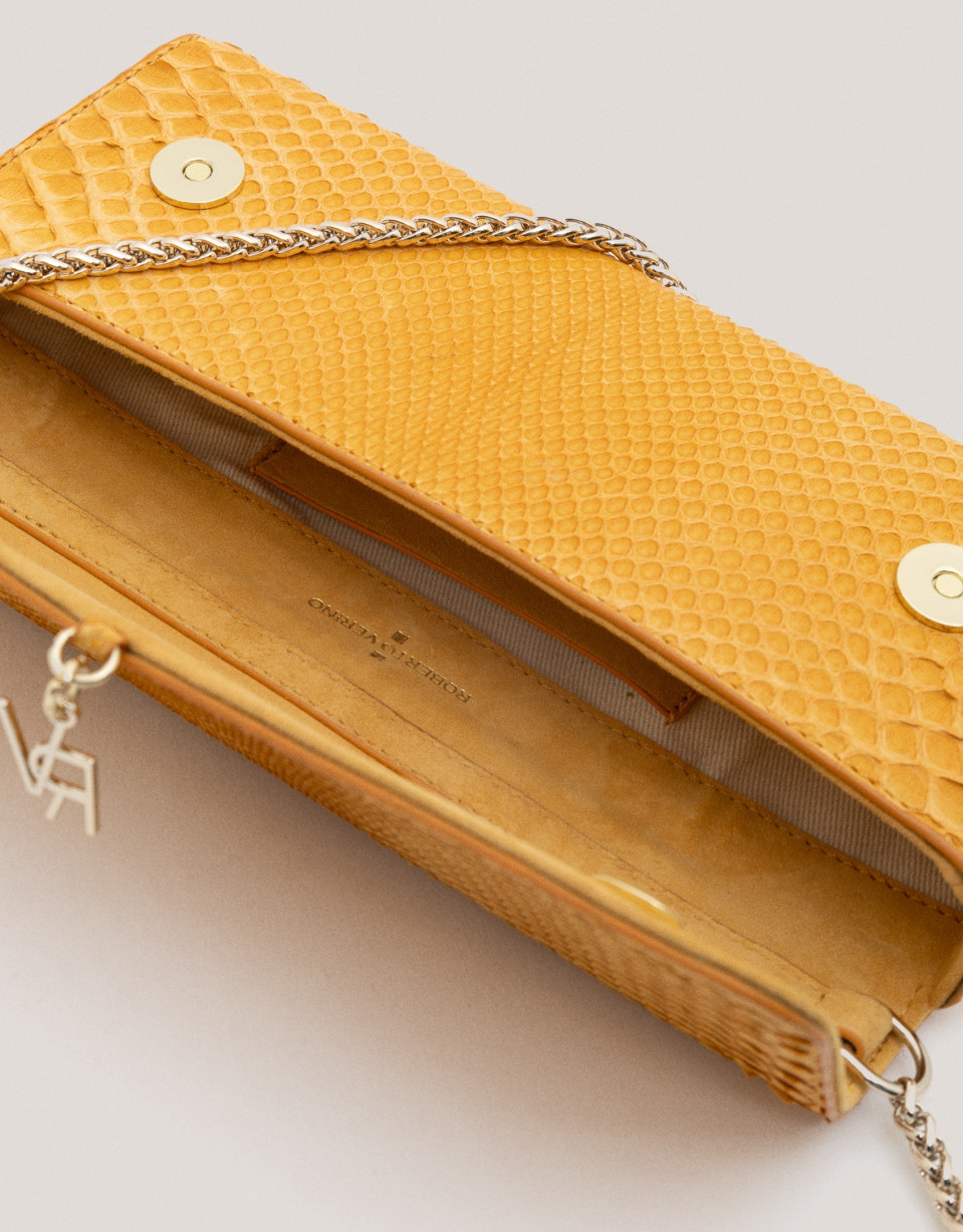 Bolso Clutch Ariana piel serpiente mostaza | Roberto Verino