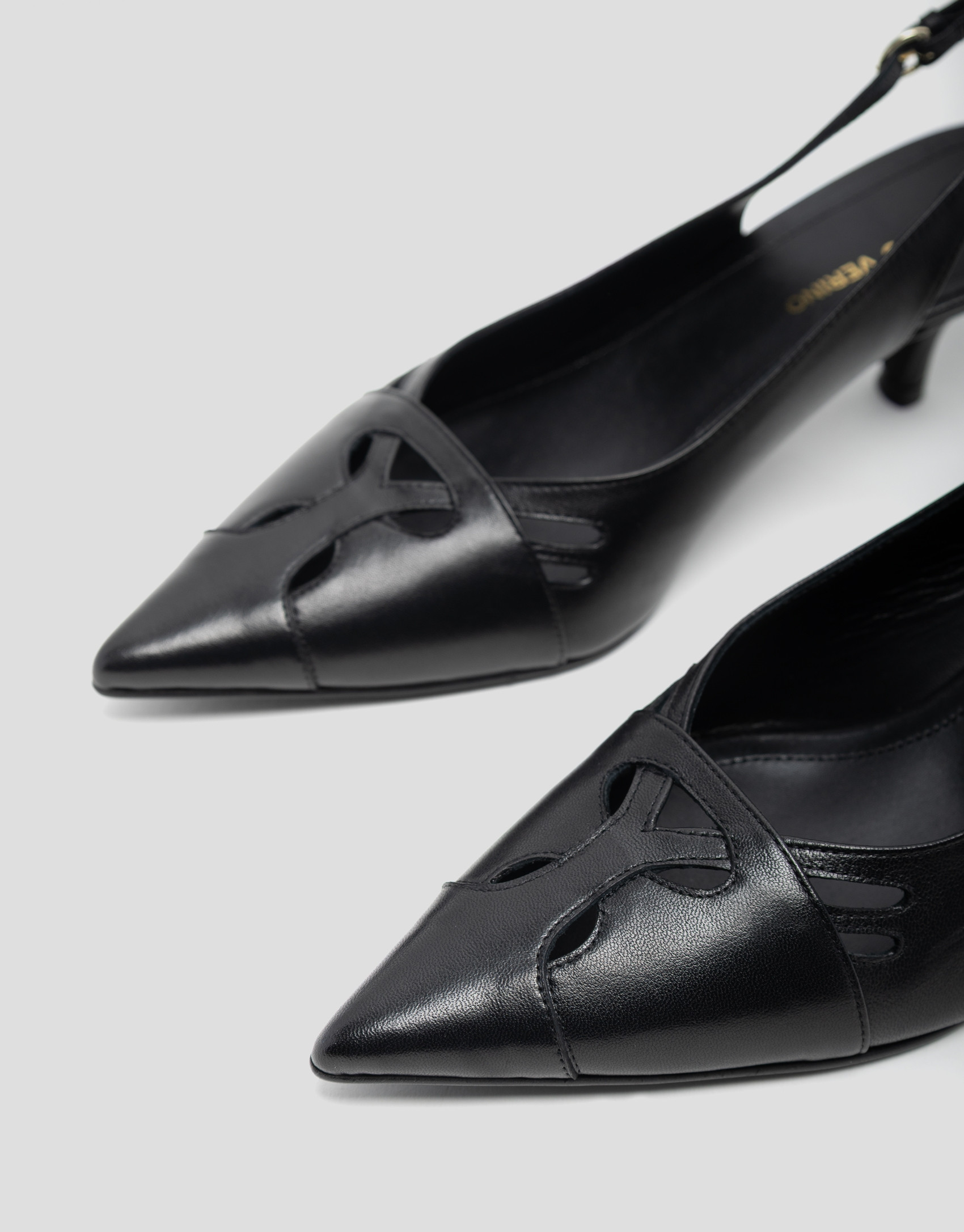 Black leather slingback court shoe with cuts