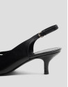 Black leather slingback court shoe with cuts