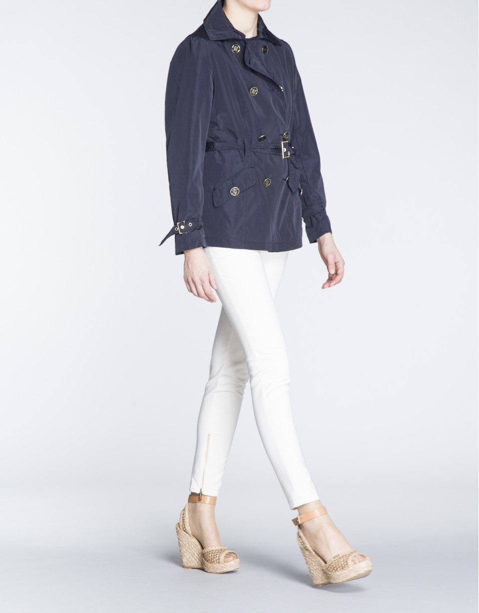 Navy blue gabardine with double row of buttons 