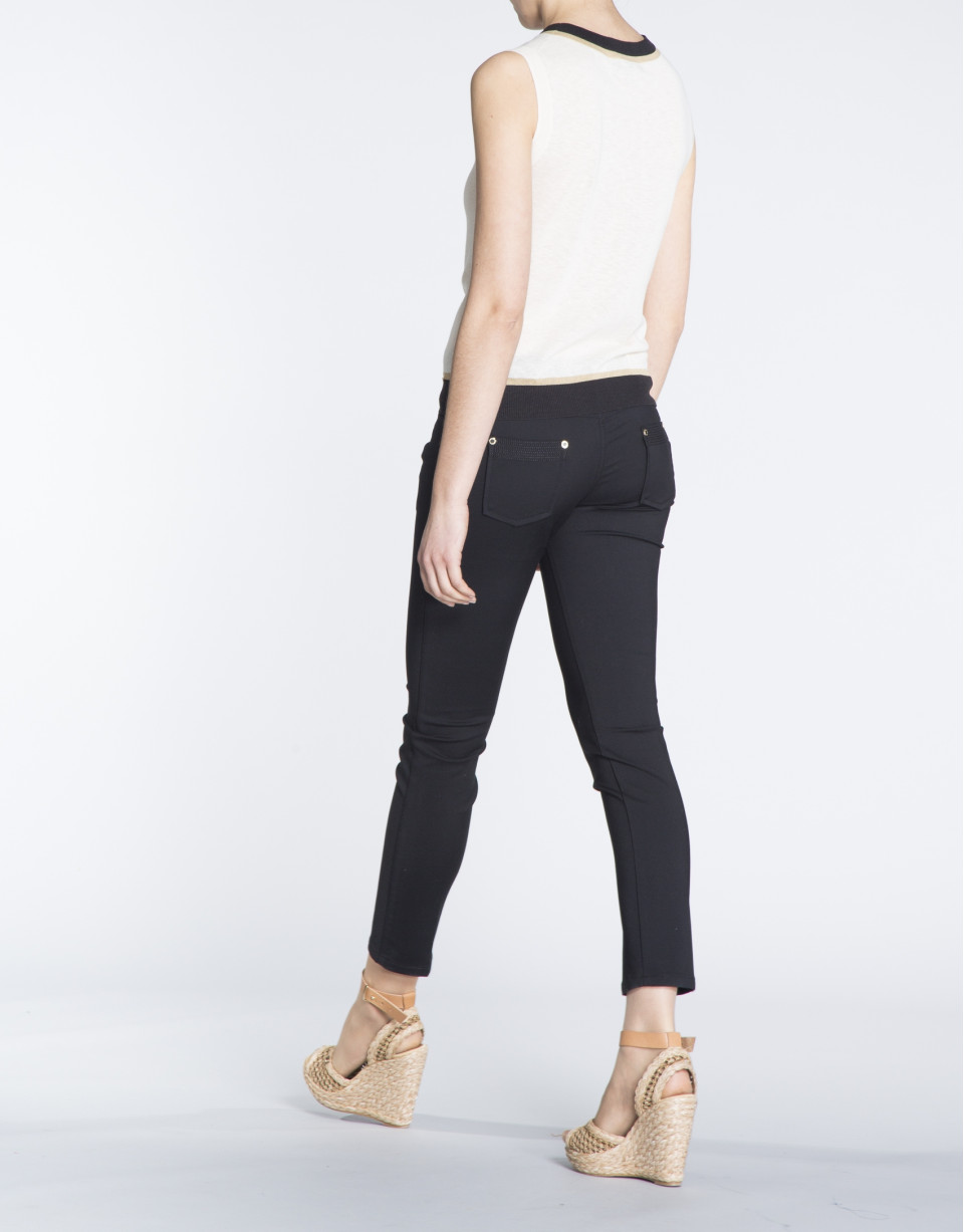 Beige knit top with navy blue and beige trim