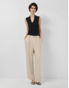 Pantalón con pliegues beige con raya ... | Roberto Verino