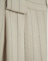 Beige pleated trousers with black pinstripes | Roberto Verino