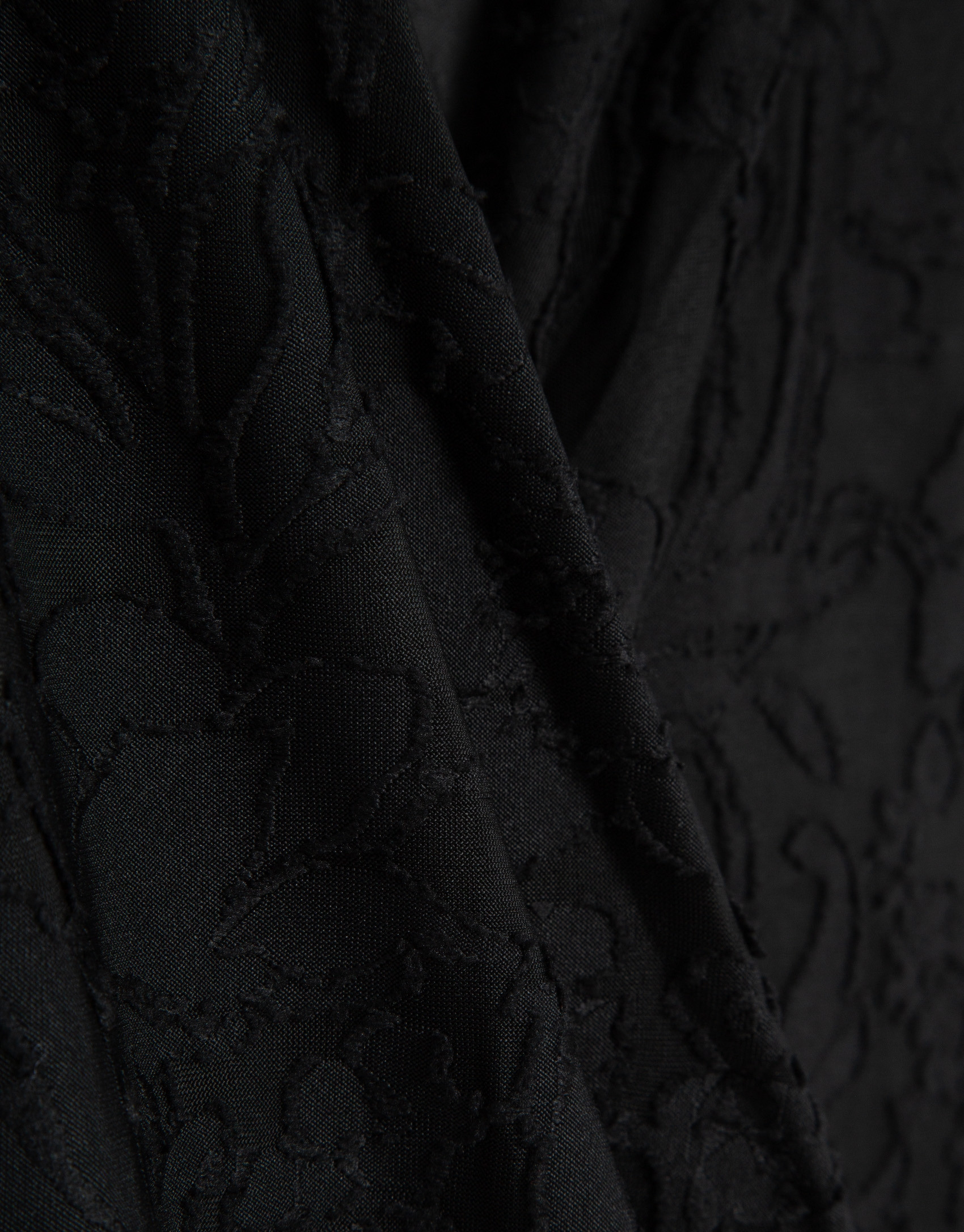 Black devoré knit crossover sleeveless T-shirt | Roberto Verino