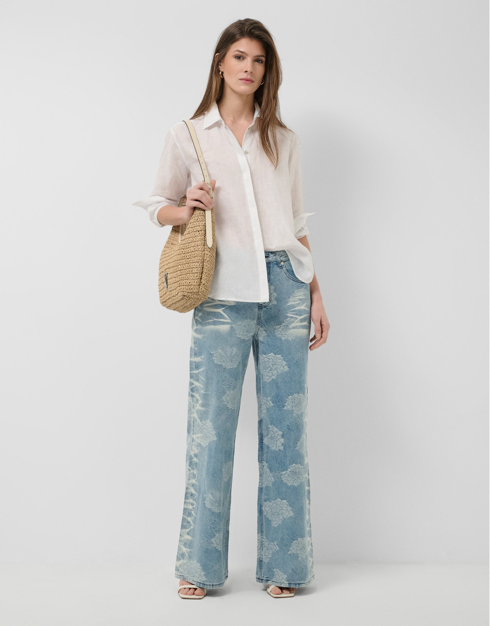 Blue wide-leg jeans with jacquard and faded ... | Roberto Verino