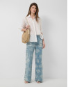 Blue wide-leg jeans with jacquard and faded ... | Roberto Verino