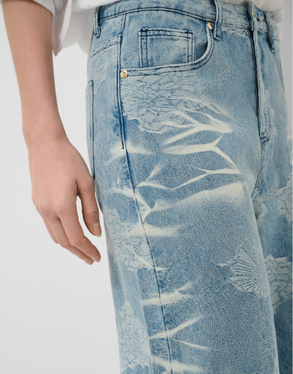 Blue wide-leg jeans with jacquard and faded ... | Roberto Verino