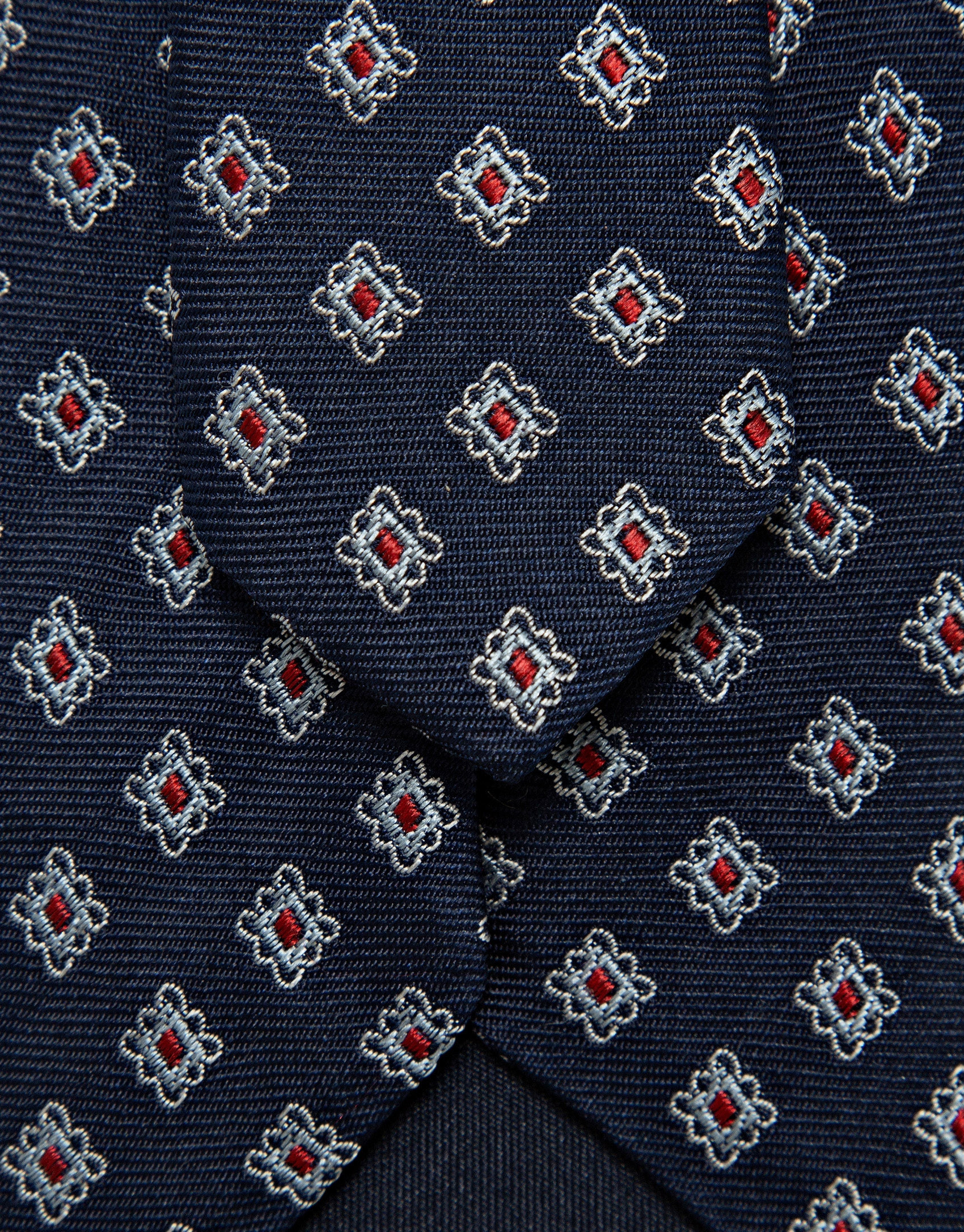 Navy blue and red geometric jacquard silk tie | Roberto Verino