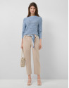 Pantalón con tapetas en tejido técnico beige | Roberto Verino