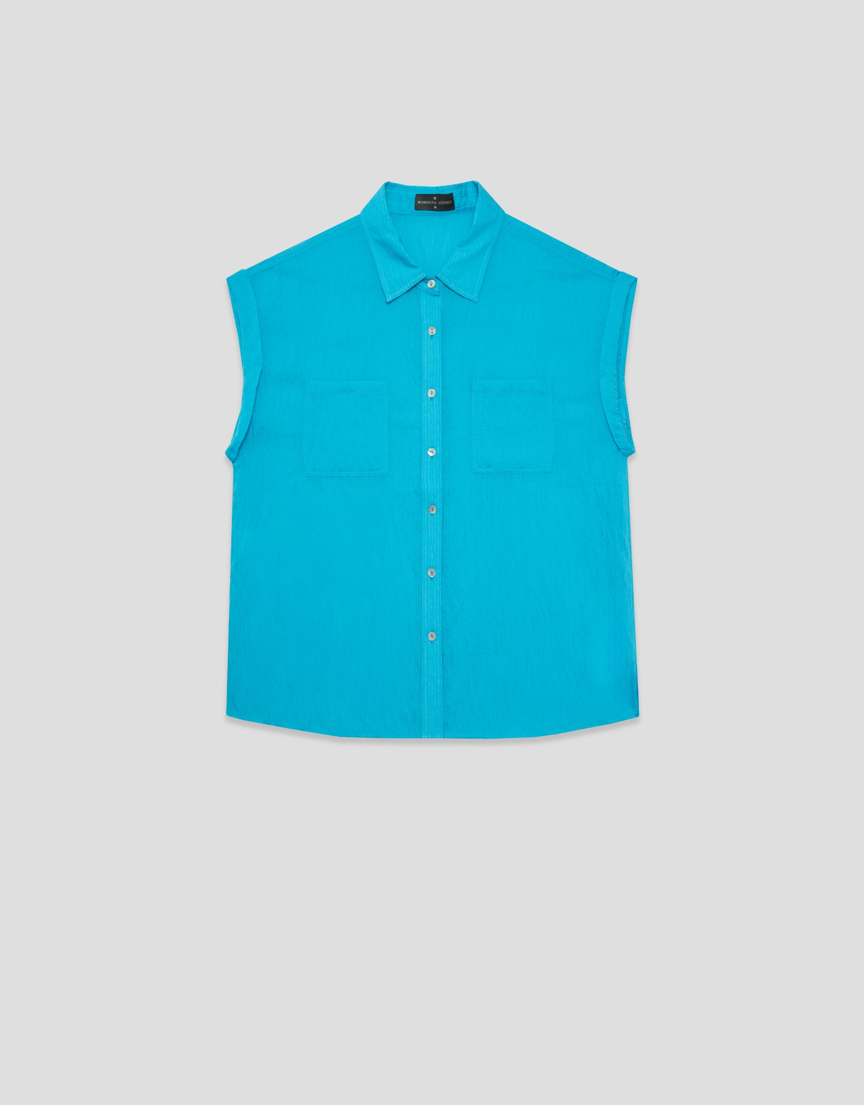Blusa sin mangas y con bolsillos azul turquesa | Roberto Verino
