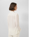Blusa gasa color crudo con volantes en pechera | Roberto Verino