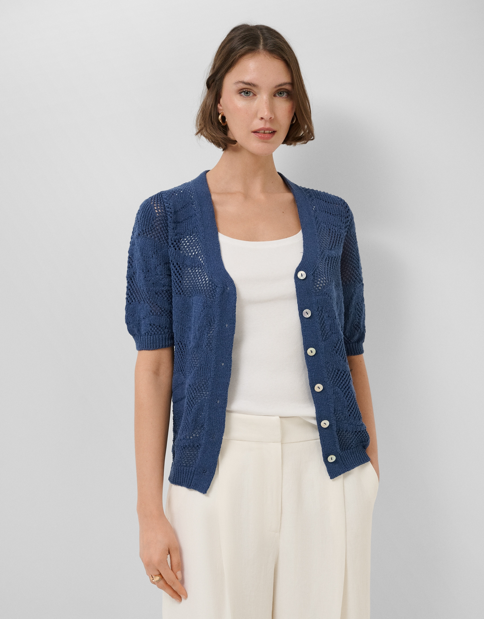 Short-sleeved jacket with navy blue floral ... | Roberto Verino