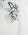 White blouse with blue floral embroidery | Roberto Verino