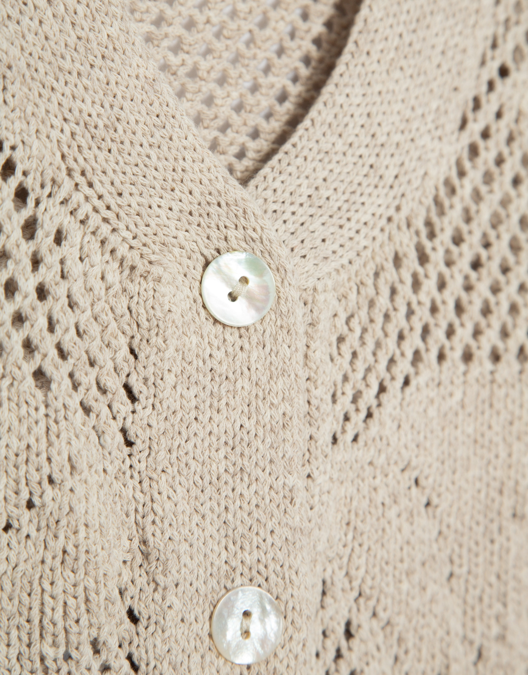 Chaqueta manga corta con calados florales ... | Roberto Verino