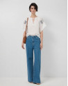 White blouse with blue floral embroidery | Roberto Verino