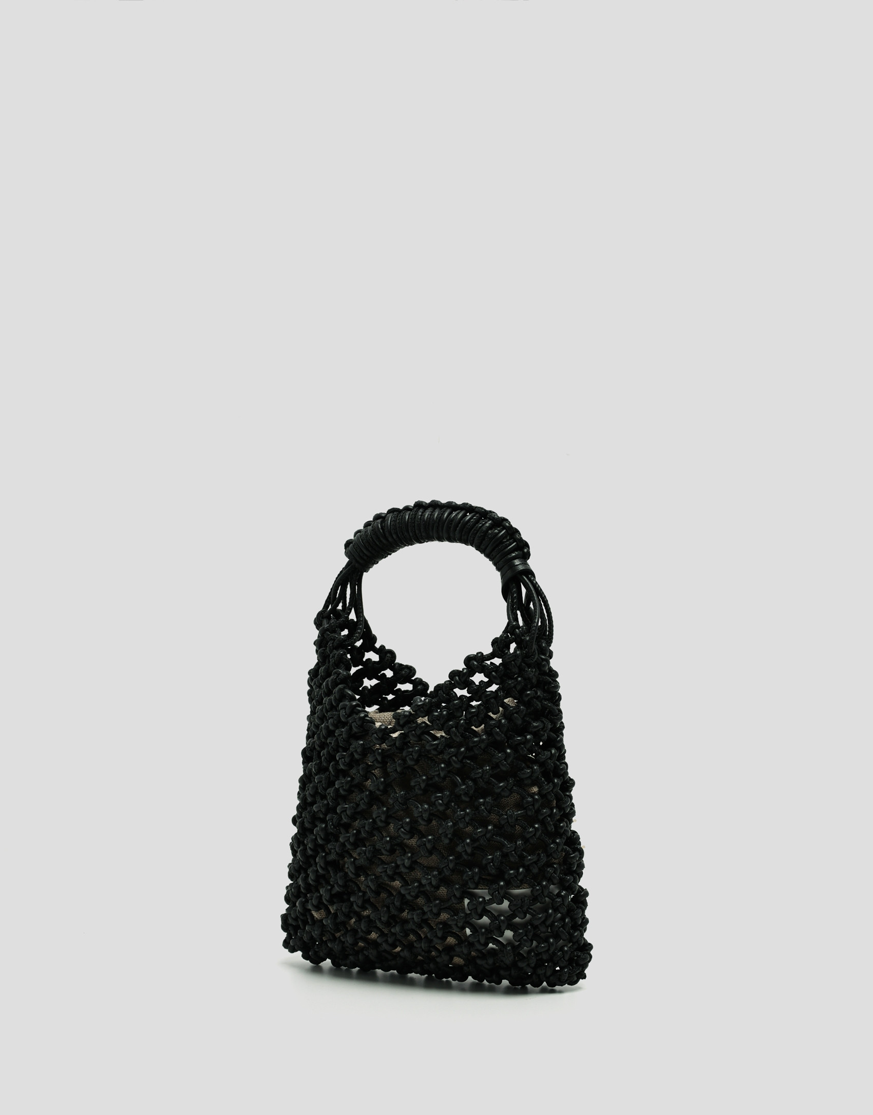 Alison Mini knotted leather handbag in black | Roberto Verino