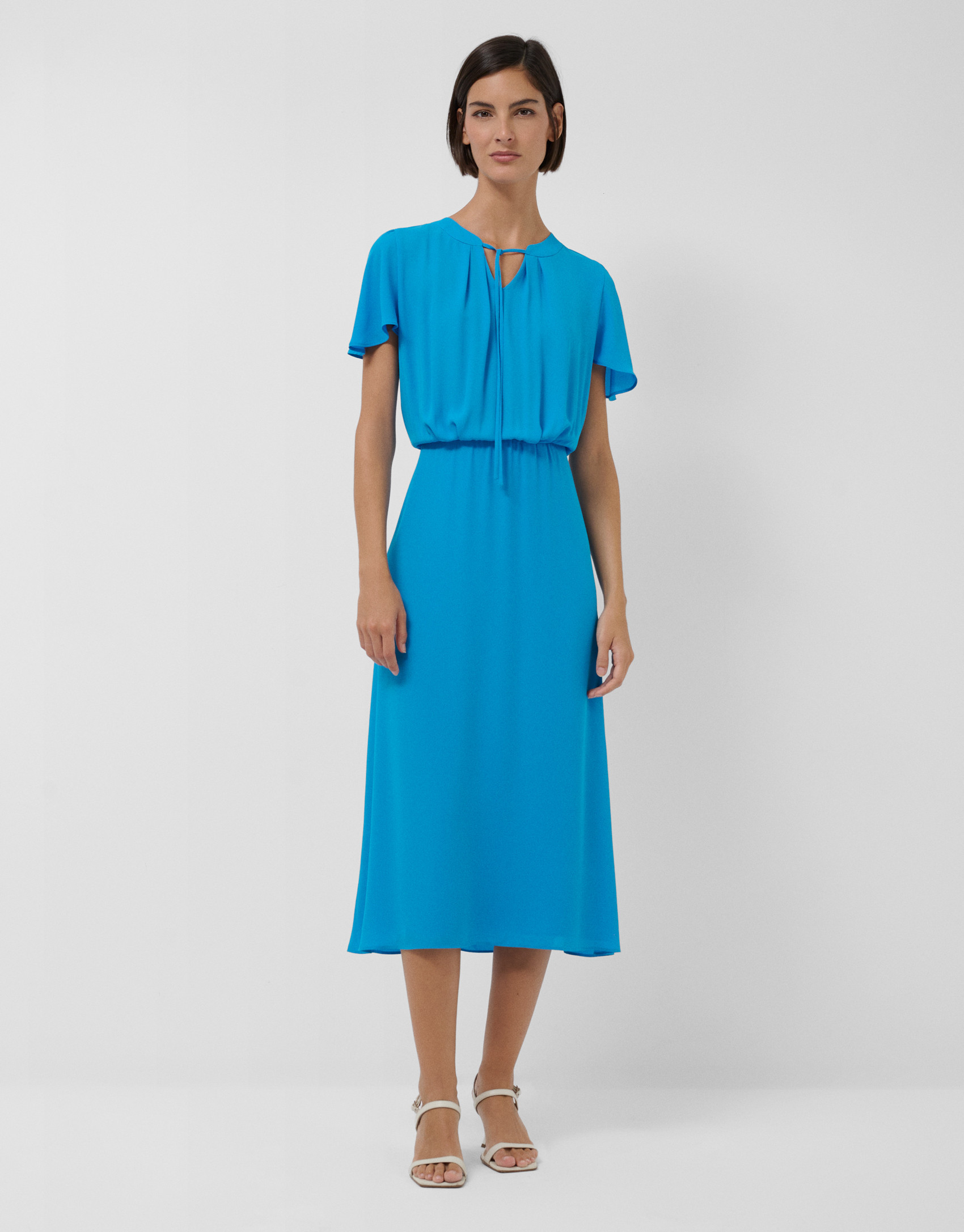 Blue gathered midi dress with cape sleeve | Roberto Verino