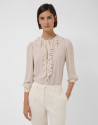 Blusa fluida crudo con volantes en pechera | Roberto Verino