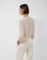 Blusa fluida crudo con volantes en pechera | Roberto Verino