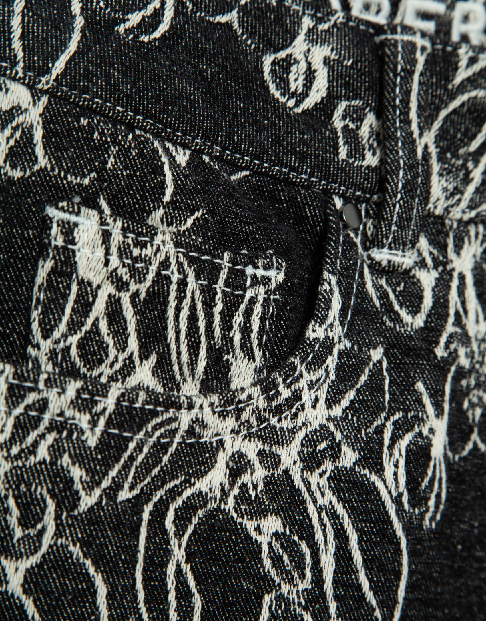 Pantalón vaquero ancho negro con jacquard crudo | Roberto Verino