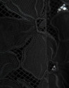 Pencil skirt in black embroidered and die-cut... | Roberto Verino