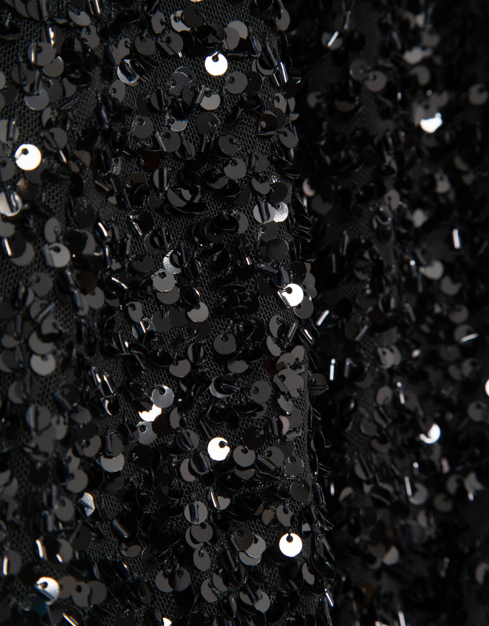 Short puffed jacket with black paillettes | Roberto Verino