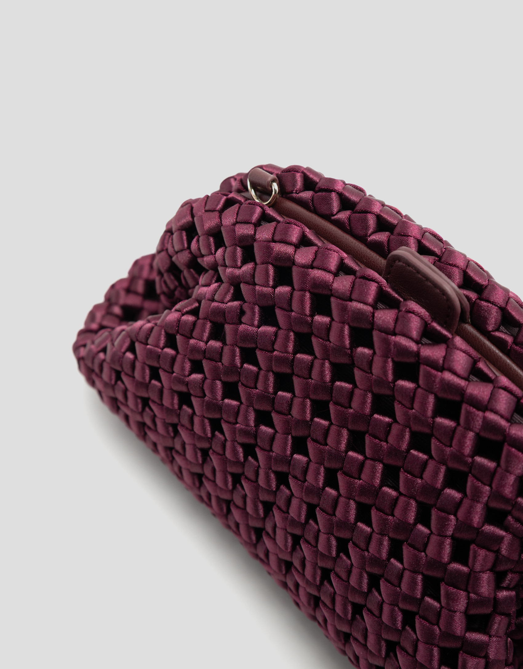 Bolso Uma clutch tejido entrelazado burdeos | Roberto Verino