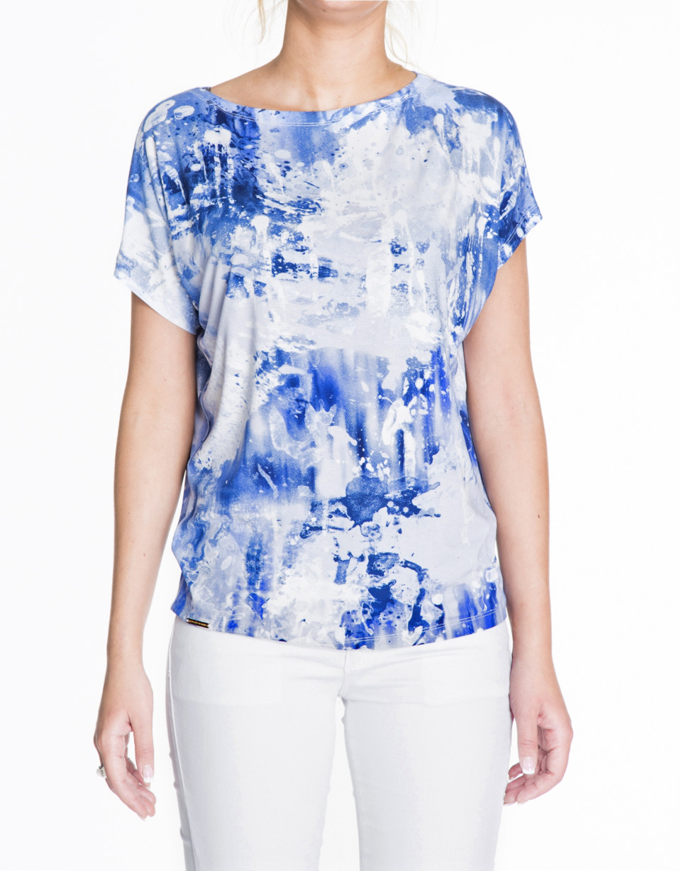Loose white top with blue print