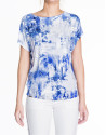 Loose white top with blue print