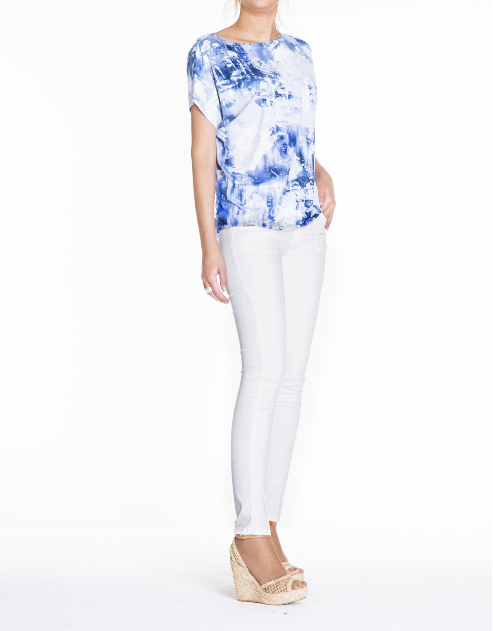 Loose white top with blue print