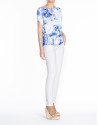 Loose white top with blue print