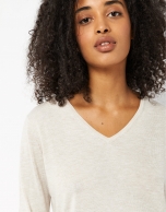 Off white, thin knit sweater with V-neck