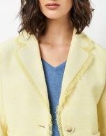 Short yellow jacket with frayed edges