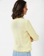 Short yellow jacket with frayed edges