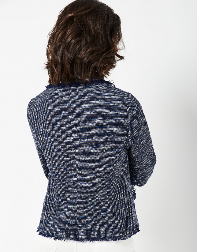 Short blue jacket with frayed edges