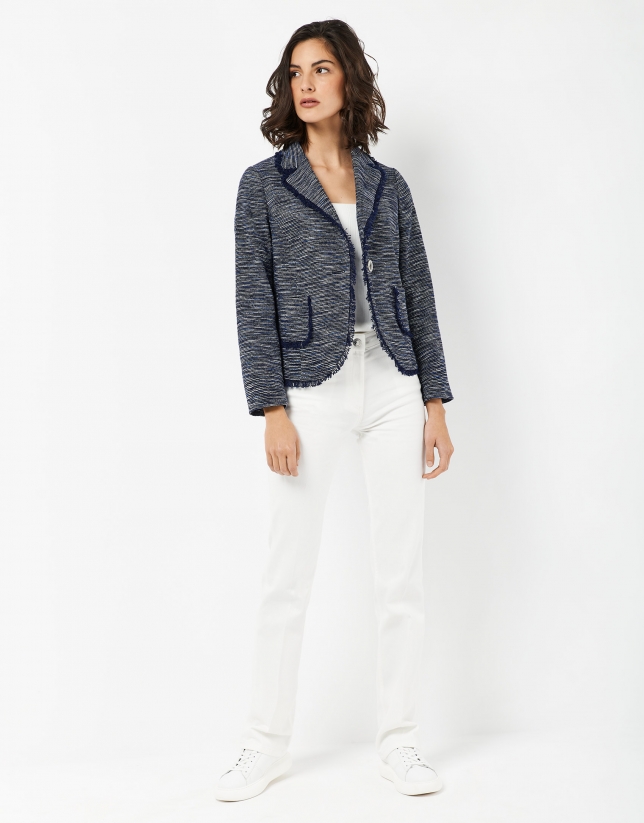 Short blue jacket with frayed edges