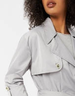Light gray raincoat with double row of buttons