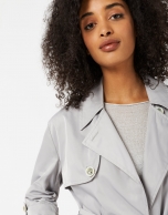 Light gray raincoat with double row of buttons
