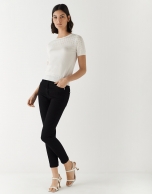 Five-pocket black denim trousers