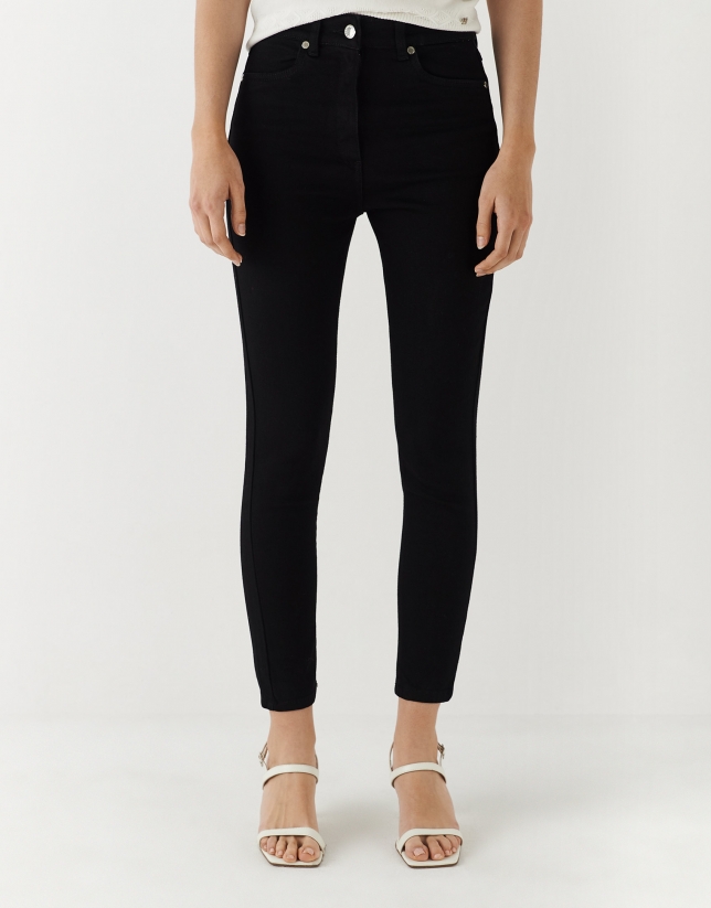 Five-pocket black denim trousers