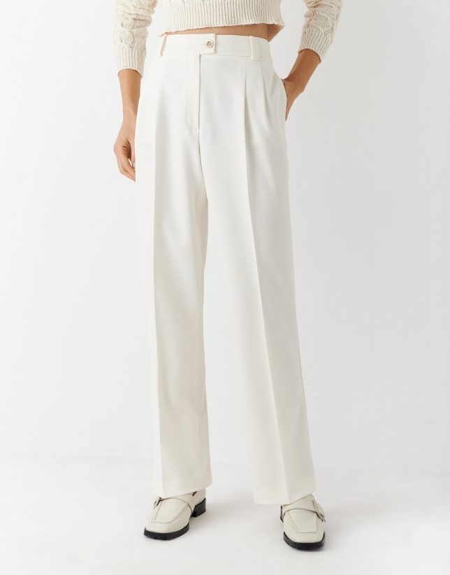 Pantal&oacute;n crep&eacute; beige claro con bordado suizo