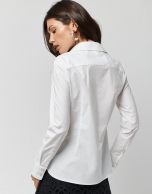 White cotton shirt with embroidered flowers in the front