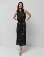 Black sleeveless dress with openwork fabric
