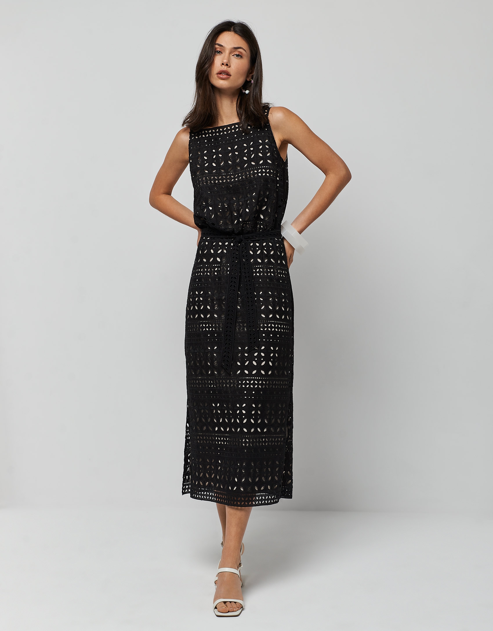 Black sleeveless dress with openwork fabric