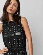Black sleeveless dress with openwork fabric