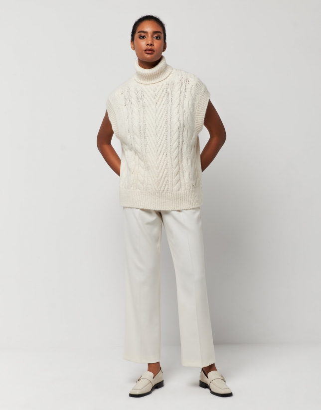 Beige knit vest with turtleneck