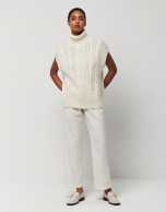 Beige knit vest with turtleneck