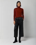 Burgundy fine knit sweater with turtleneck.