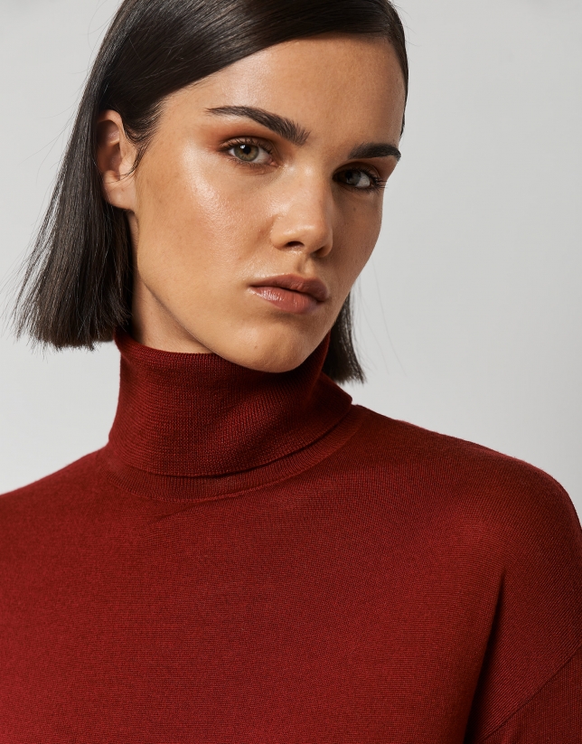 Burgundy fine knit sweater with turtleneck.